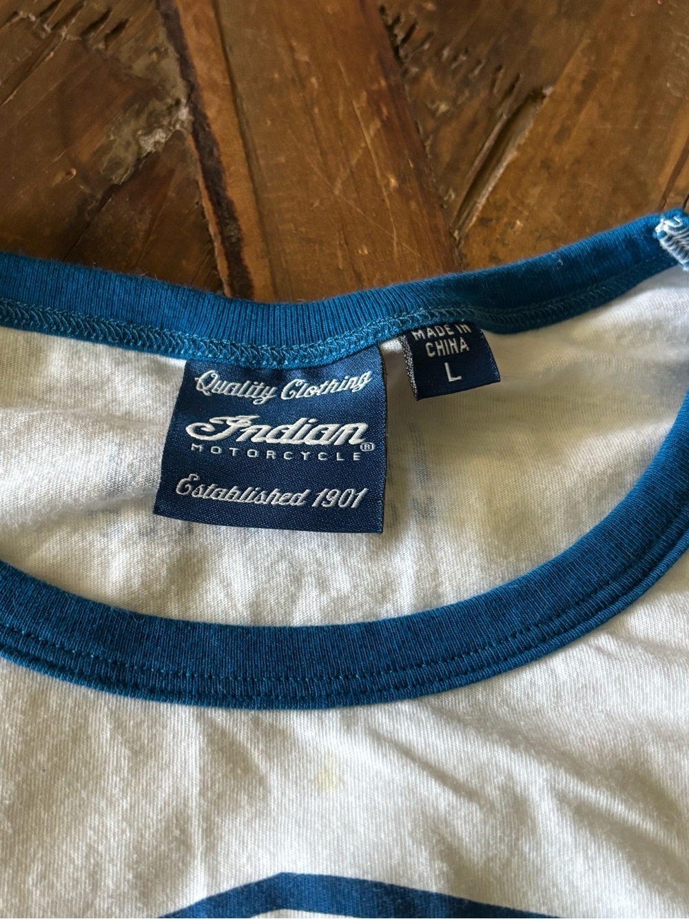 Indian Motorcycle Women’s White Logo Tee with Blue & Maroon Striped Accents - Picture 6 of 8